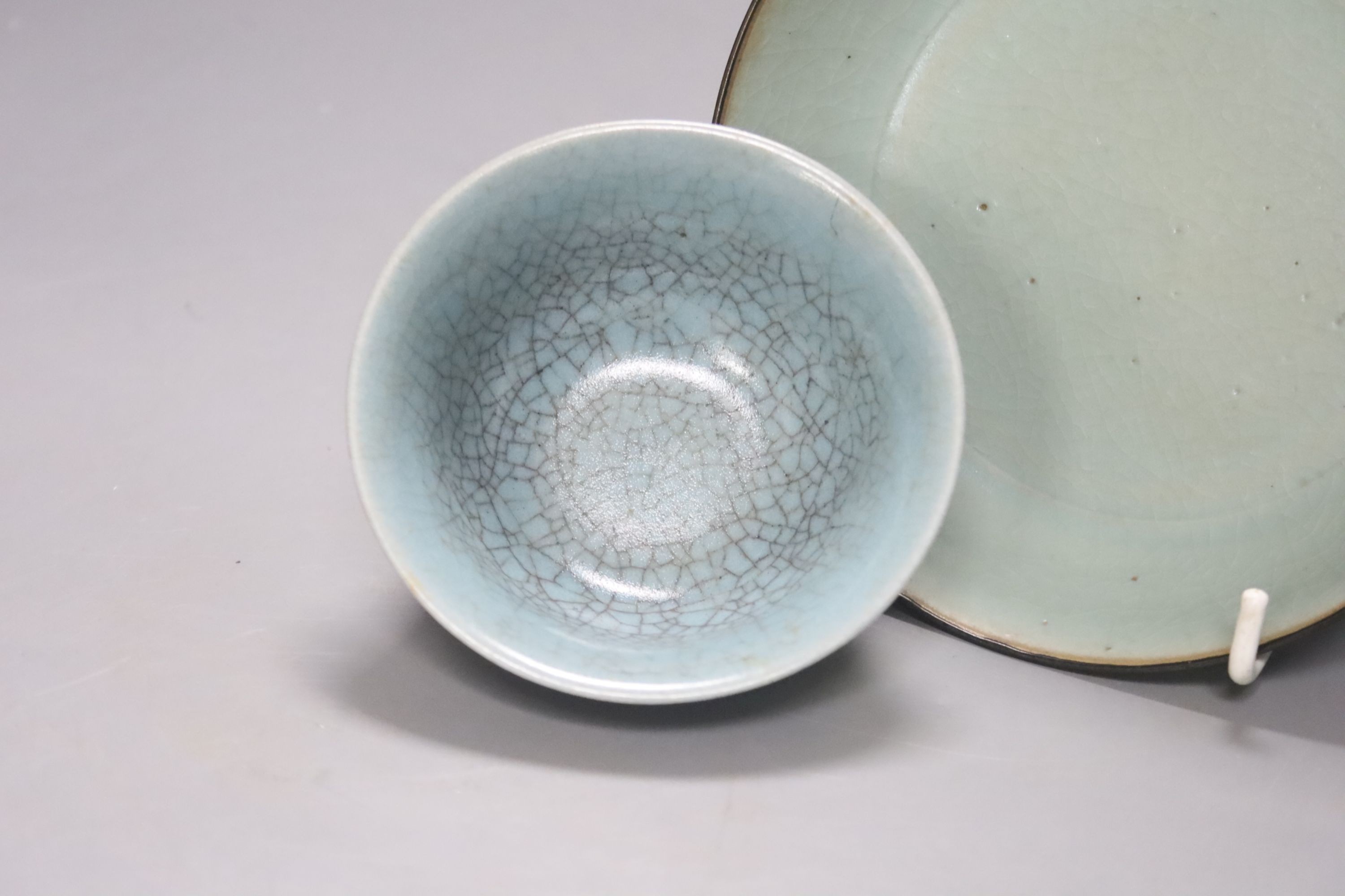 A Chinese celadon bowl and a teabowl, diameter 15cm